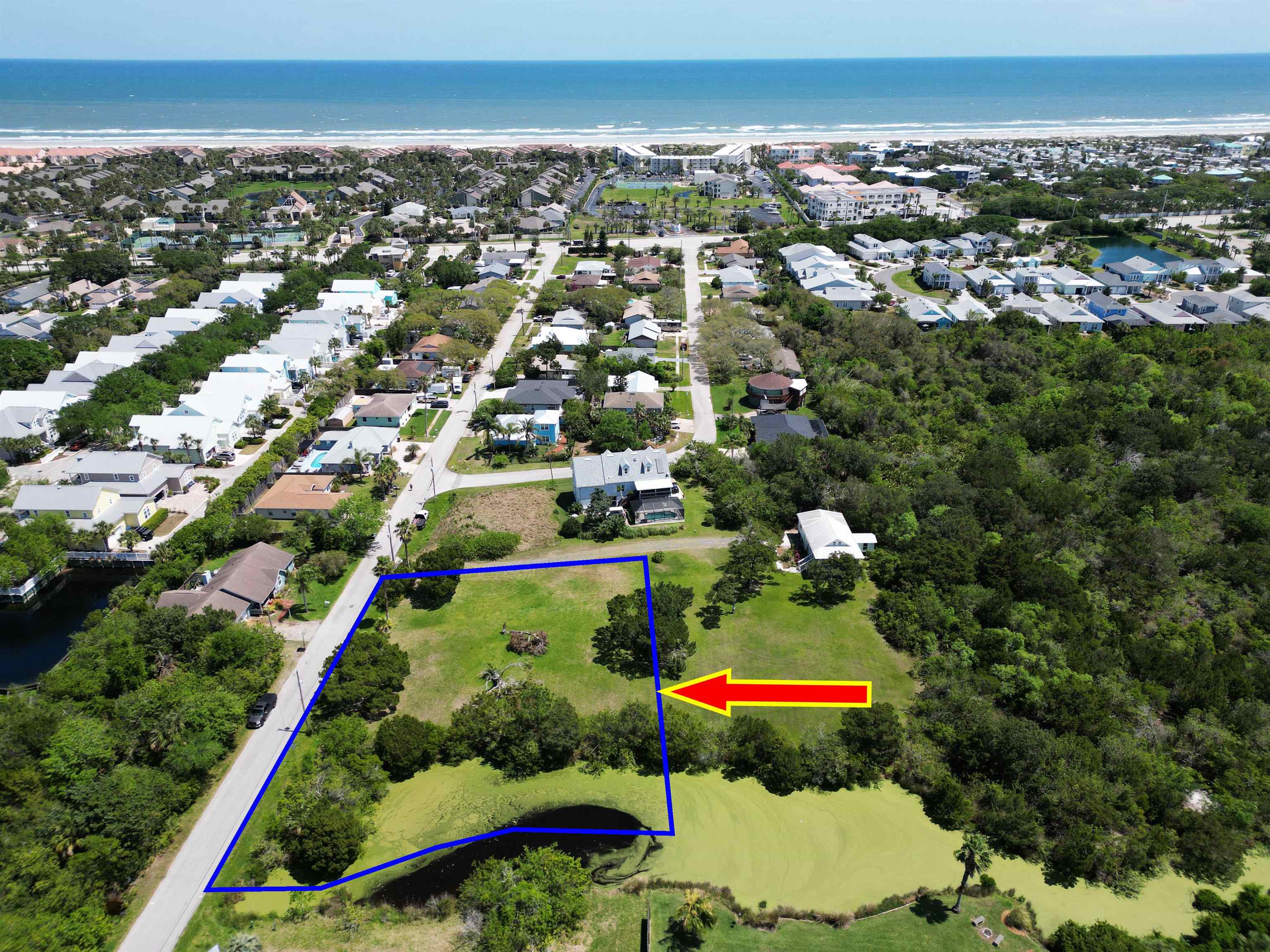 267 Trade Wind Lane St. Augustine, FL 32080 - Photo 7 of 14 an aerial view of residential houses and car parked