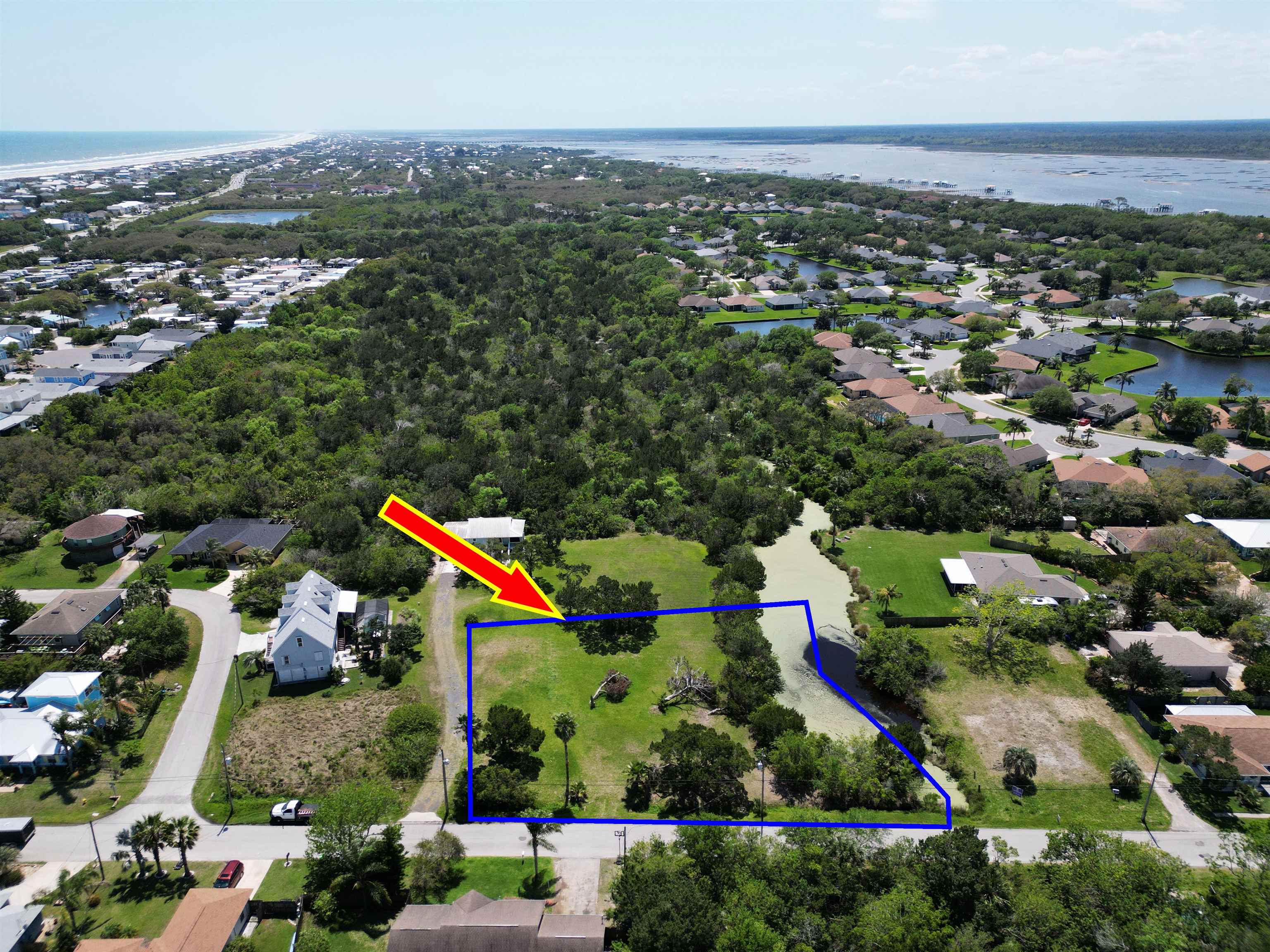 267 Trade Wind Lane St. Augustine, FL 32080 - Photo 10 of 14 an aerial view of residential houses with outdoor space and trees