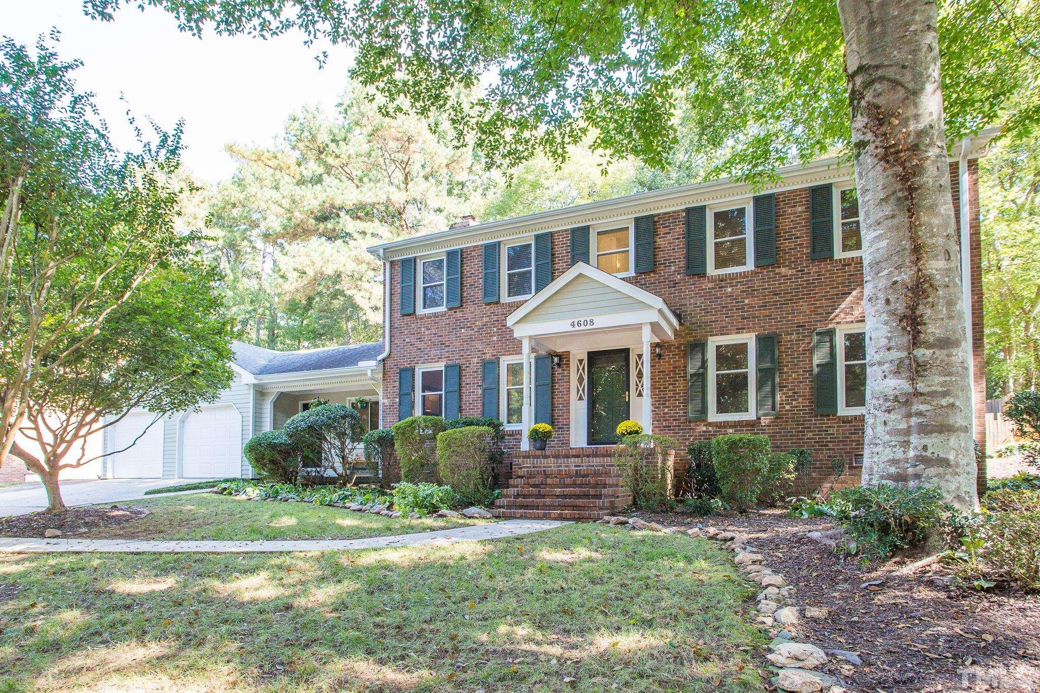 4608 Oak Park Road Raleigh, NC 27612 - Photo 1 of 30 a front view of a house with a yard
