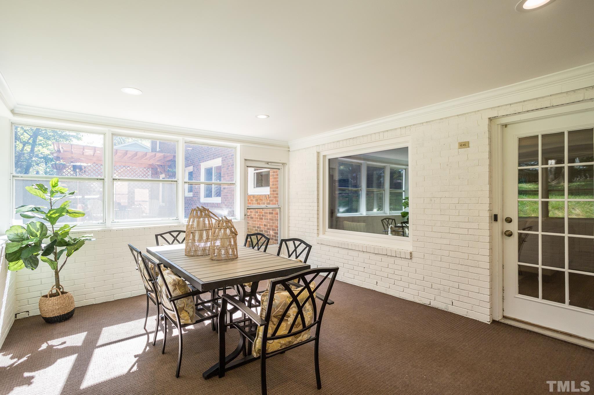 4608 Oak Park Road Raleigh, NC 27612 - Photo 14 of 30 a dining room with furniture and window