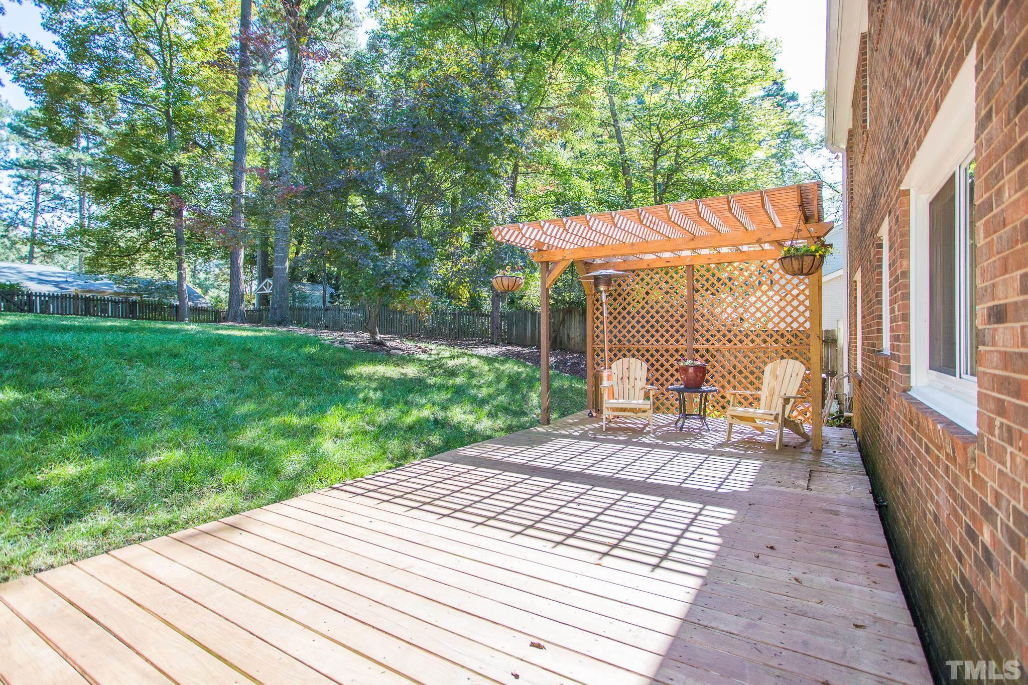4608 Oak Park Road Raleigh, NC 27612 - Photo 29 of 30 a view of a backyard with a patio