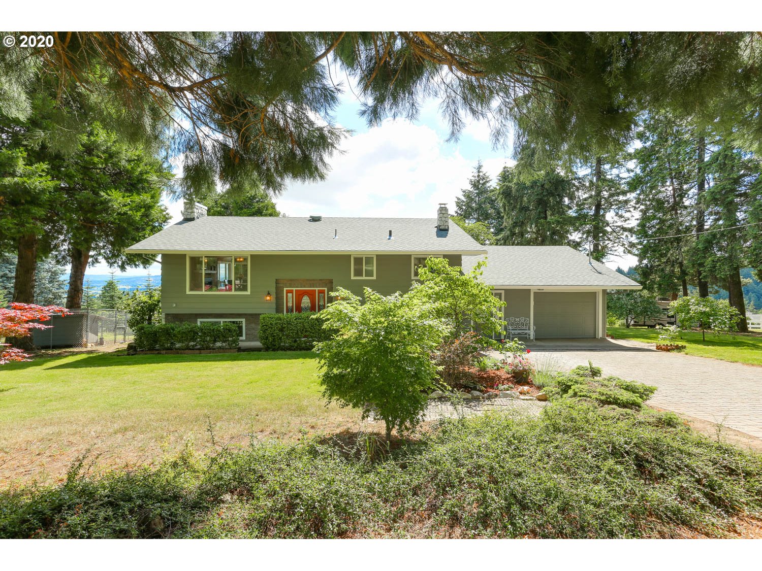 33672 Southwest Laurel Road Hillsboro, OR 97123 - Photo 2 of 32 a view of a house with a yard and potted plants