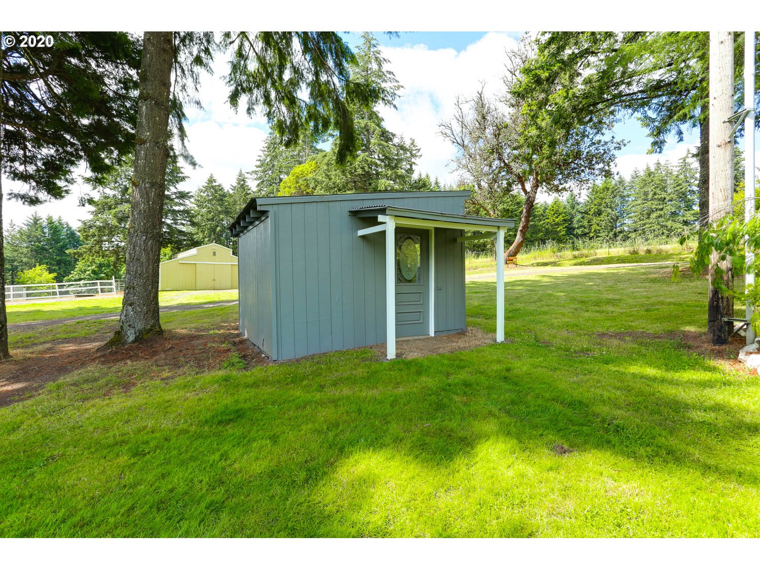33672 Southwest Laurel Road Hillsboro, OR 97123 - Photo 23 of 32 a view of a backyard with large trees