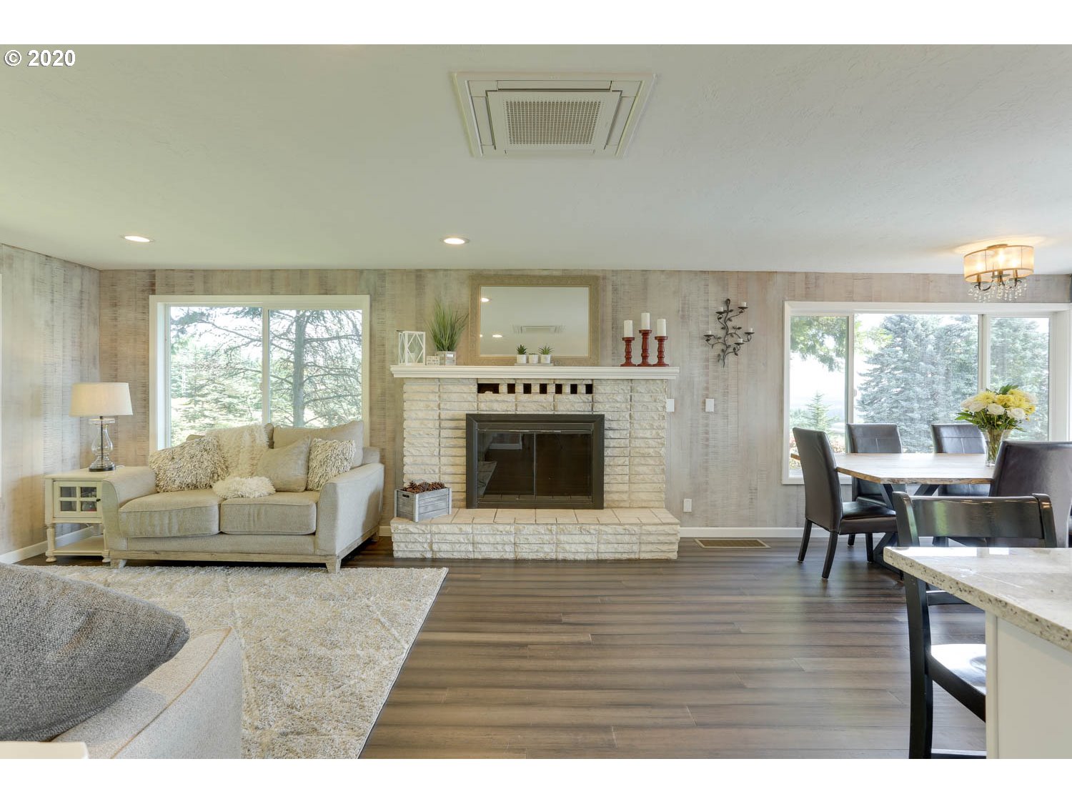 33672 Southwest Laurel Road Hillsboro, OR 97123 - Photo 4 of 32 a living room with furniture and a fireplace