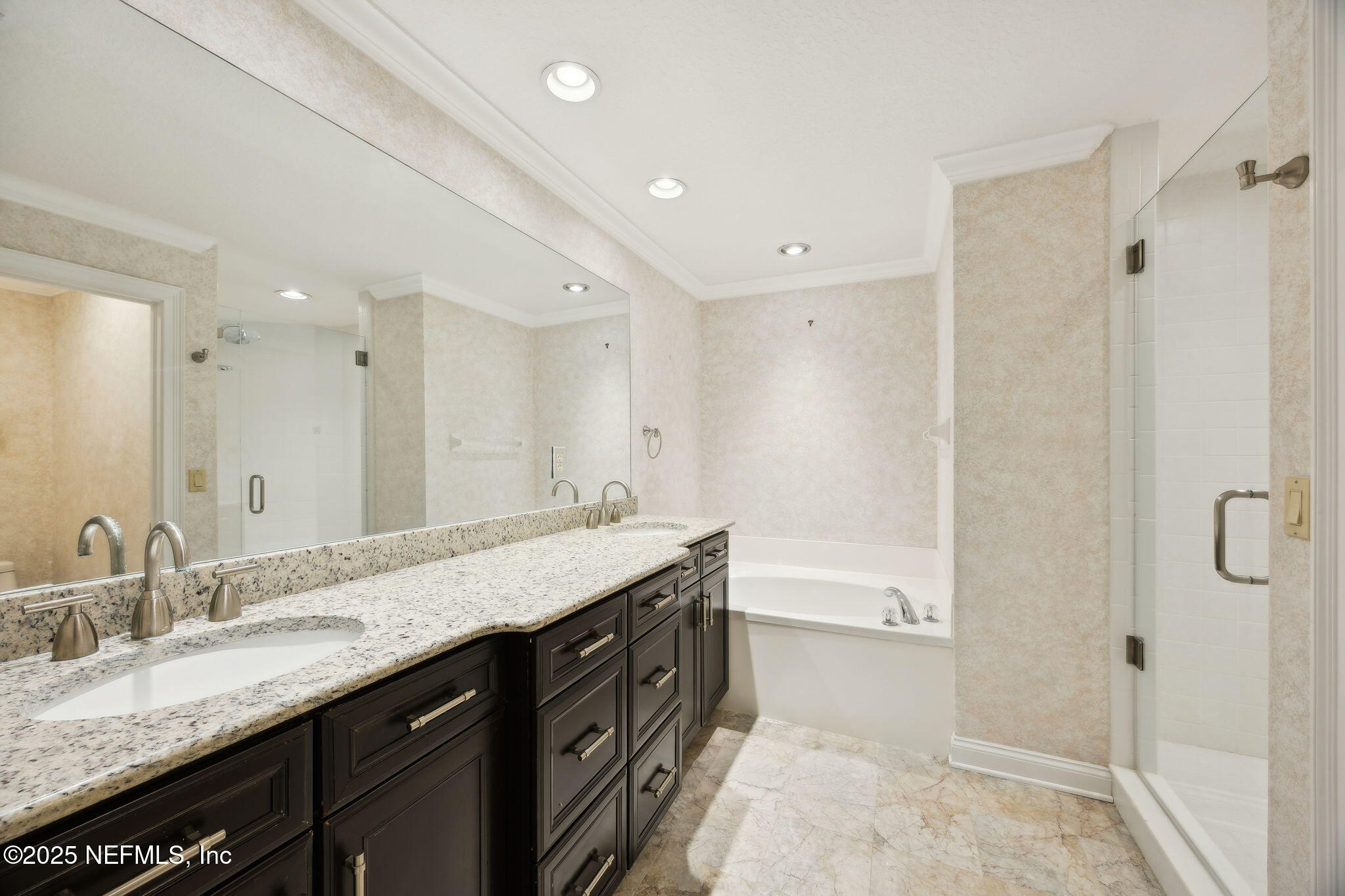 300 Bermuda Bay Circle, Unit 304 Ponte Vedra Beach, FL 32082 - Photo 23 of 42 a bathroom with a granite countertop sink mirror and a shower