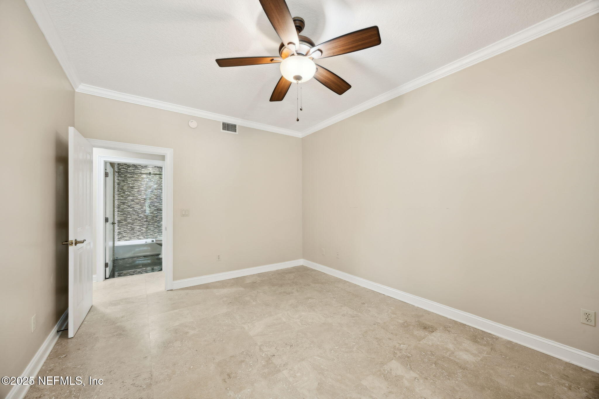 300 Bermuda Bay Circle, Unit 304 Ponte Vedra Beach, FL 32082 - Photo 30 of 42 an empty room with fan