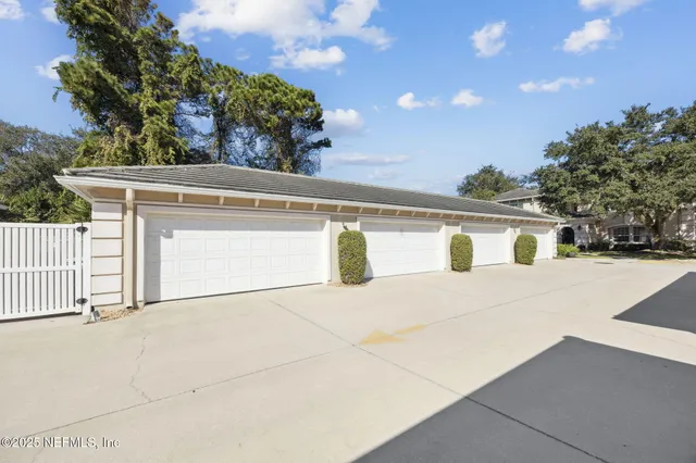 a view of a yard with an ocean view