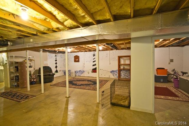 194 McCrary Road Mooresville, NC 28117 - Photo 22 of 23 a view of a garage with wooden floor