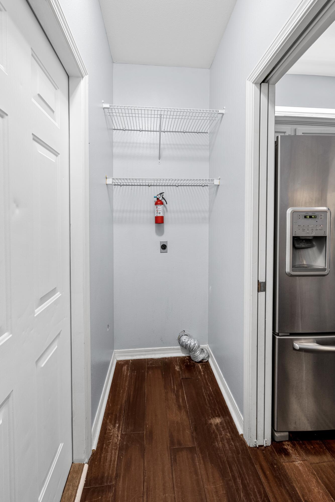 96 Trista Terrace Court Destin, FL 32541 - Photo 16 of 36 a view of a kitchen with wooden floor