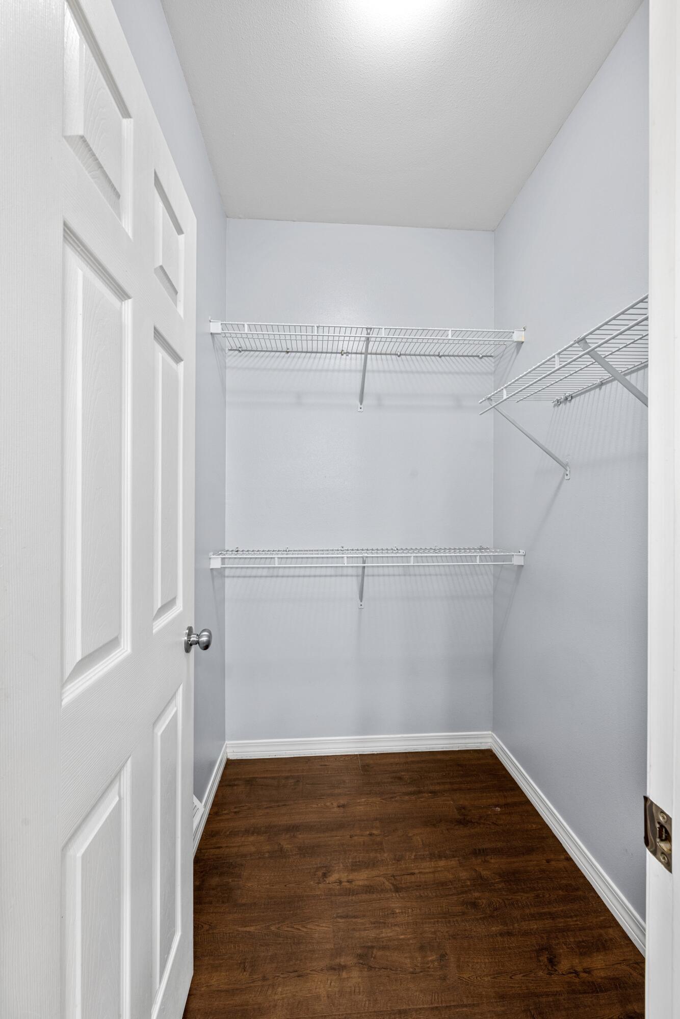 96 Trista Terrace Court Destin, FL 32541 - Photo 20 of 36 a view of a room with wooden floor and a window