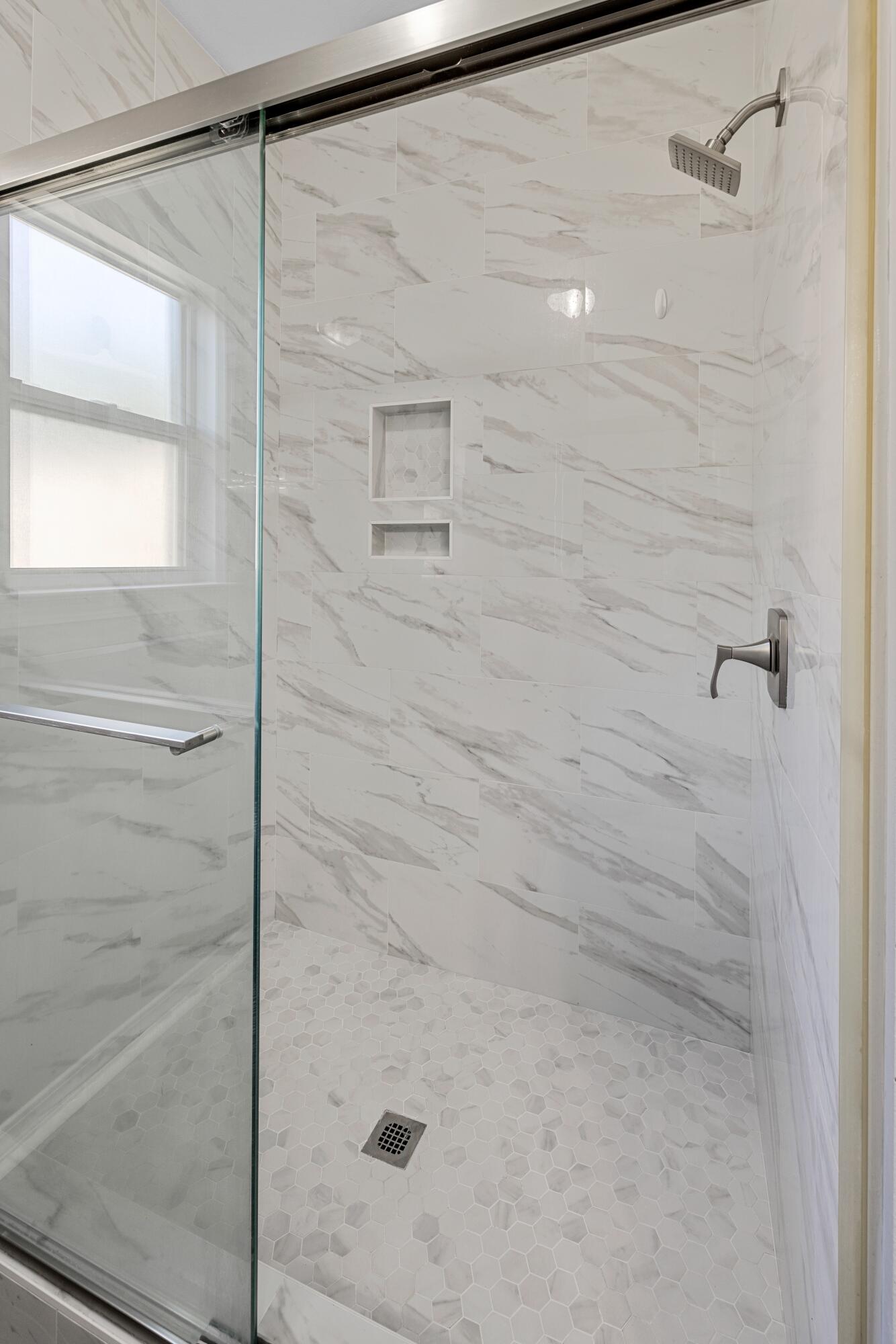 96 Trista Terrace Court Destin, FL 32541 - Photo 23 of 36 a bathroom with a shower