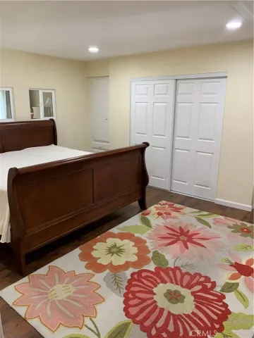 a bathroom with a toilet and a shower curtain