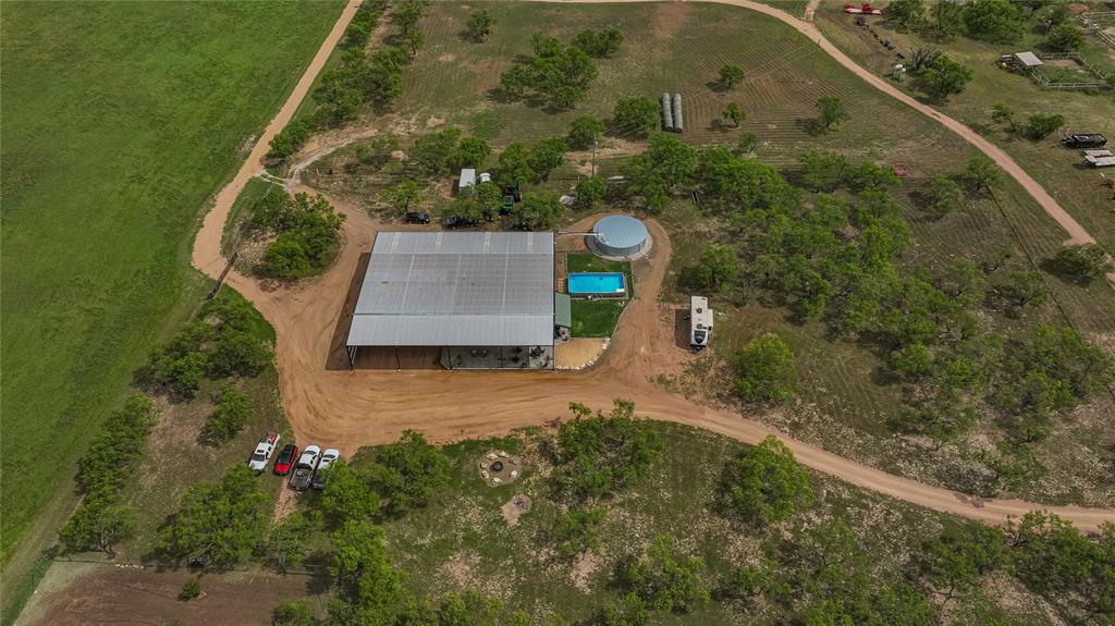 1250 County Road Brady, TX 76825 - Photo 5 of 40 an aerial view of a house with a yard
