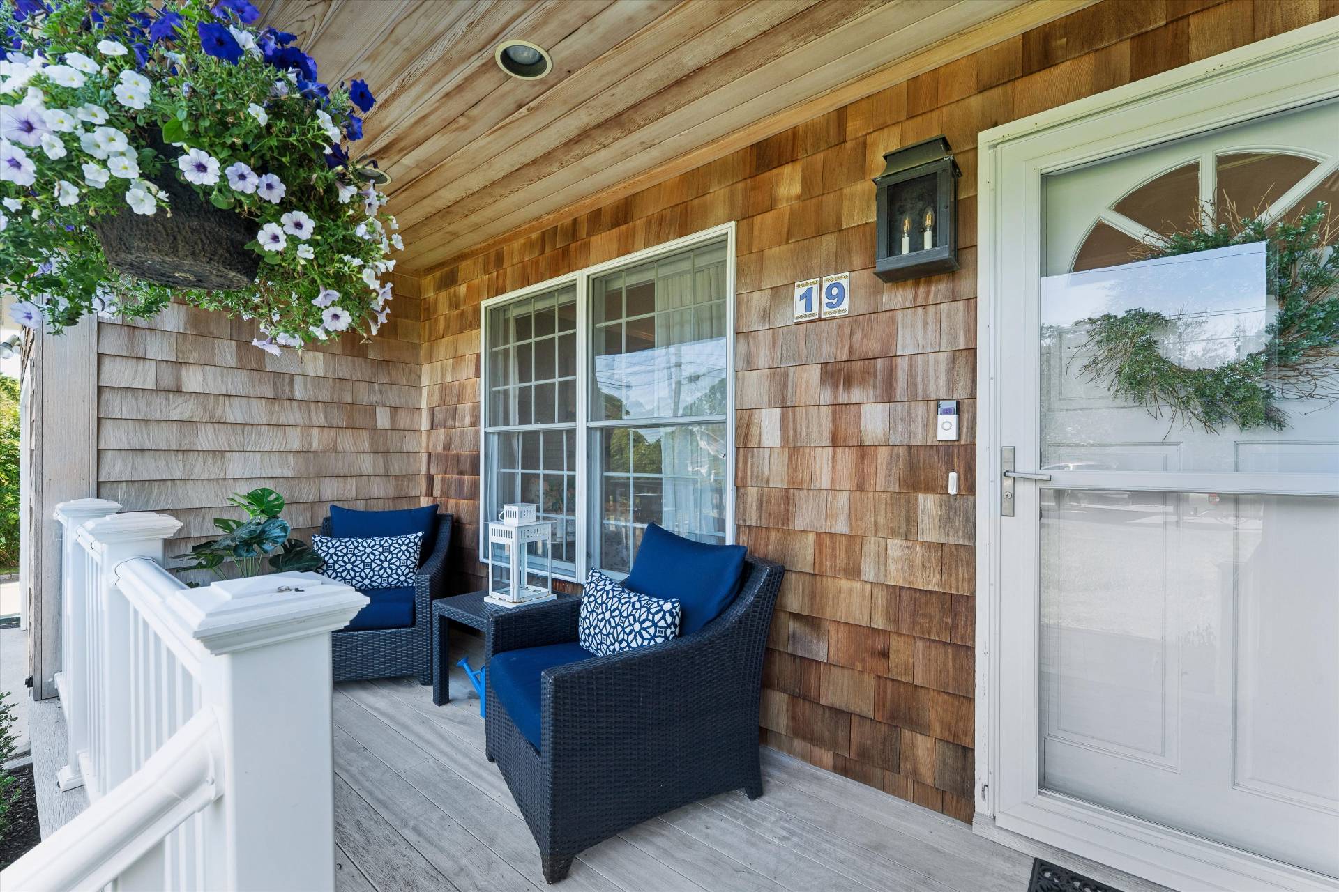 19 Maple Street Westhampton Beach, NY 11978 - Photo 4 of 23 a view of a patio with couches and potted plants