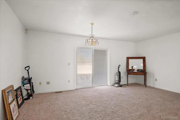 a view of a bedroom with a window