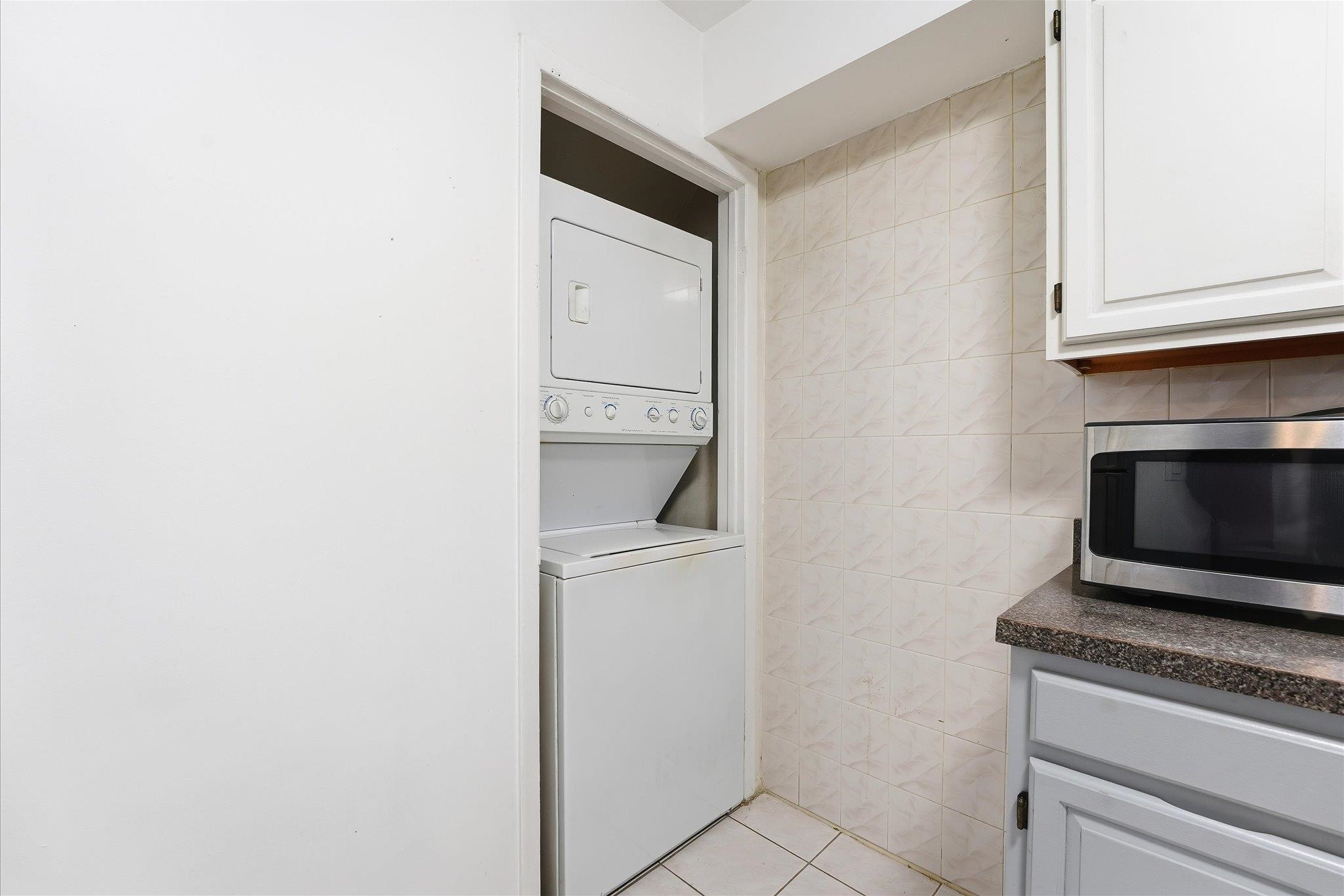 41 Alan Terrace, Unit 1 Jersey City, NJ 07306 - Photo 13 of 16 a hallway with washer and dryer