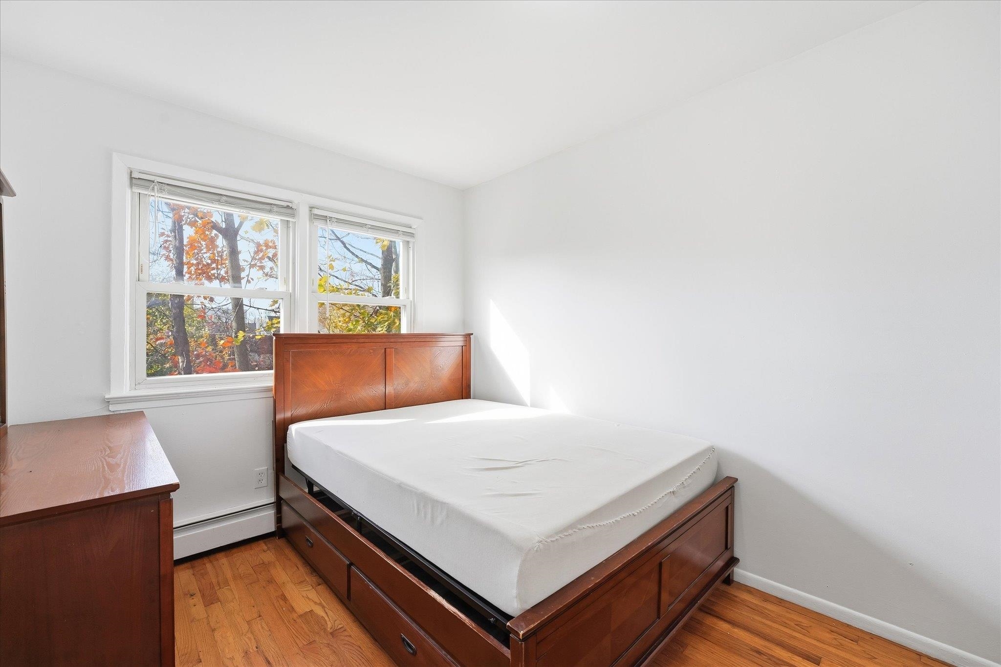 41 Alan Terrace, Unit 1 Jersey City, NJ 07306 - Photo 15 of 16 a bedroom with a bed and a window