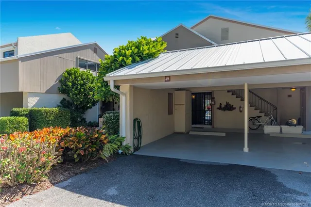 a view of a house with a porch
