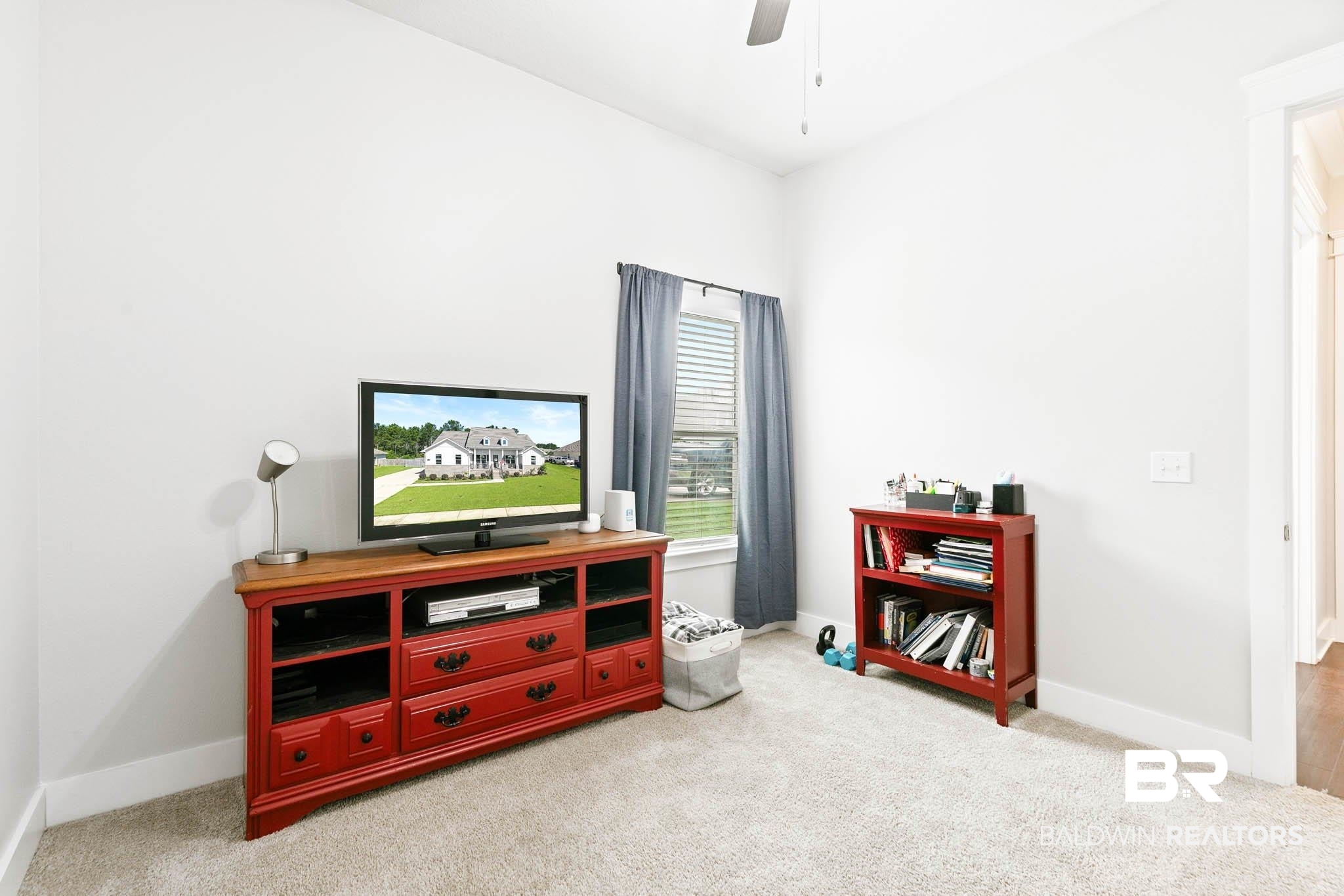 12785 Warbler Street Daphne, AL 36527 - Photo 21 of 53 Living area with light carpet and ceiling fan