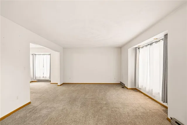 an empty room with window