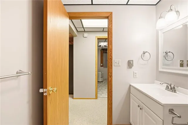 a view of a hallway with seating area