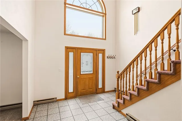 a view of an entryway with staircase