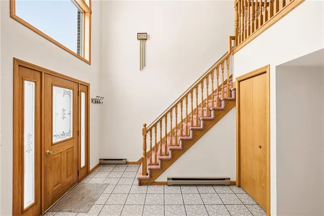 a view of an entryway with staircase