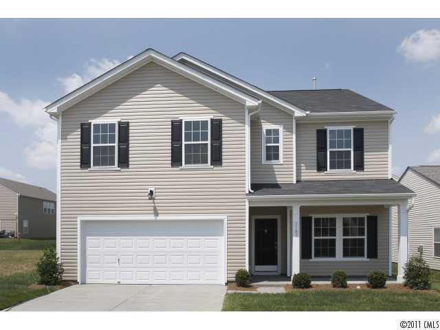 2187 Durand Road, Unit 83 Fort Mill, SC 29715 - Photo 1 of 16 a front view of a house with a yard