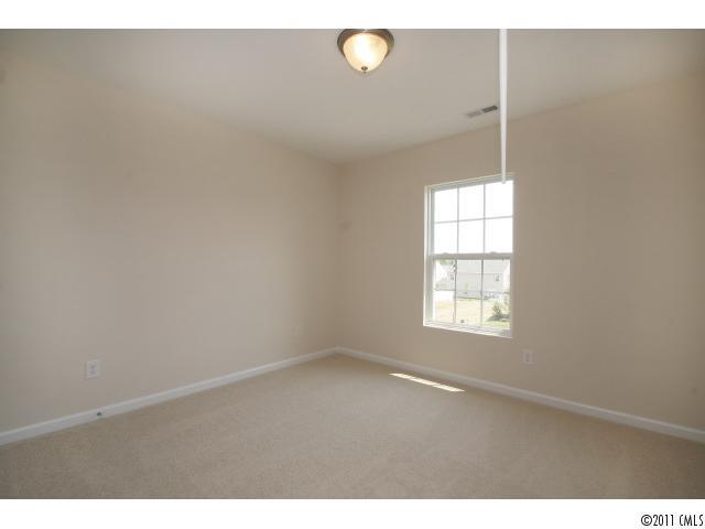 2187 Durand Road, Unit 83 Fort Mill, SC 29715 - Photo 14 of 16 a view of an empty room with a window