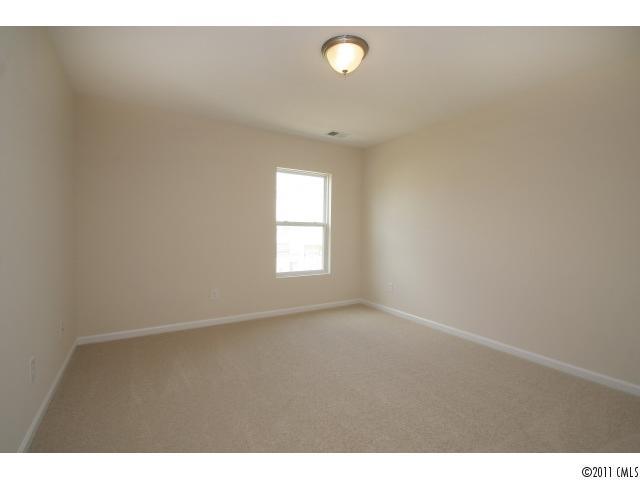 2187 Durand Road, Unit 83 Fort Mill, SC 29715 - Photo 15 of 16 a view of an empty room with a window