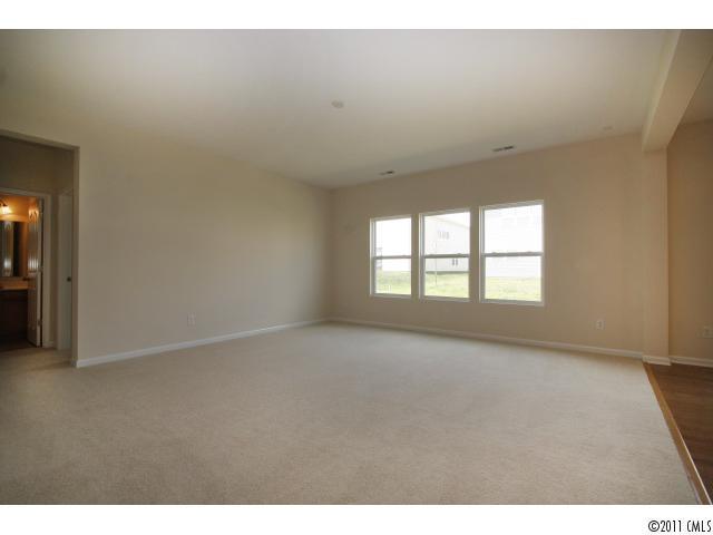 2187 Durand Road, Unit 83 Fort Mill, SC 29715 - Photo 3 of 16 a view of an empty room with a window