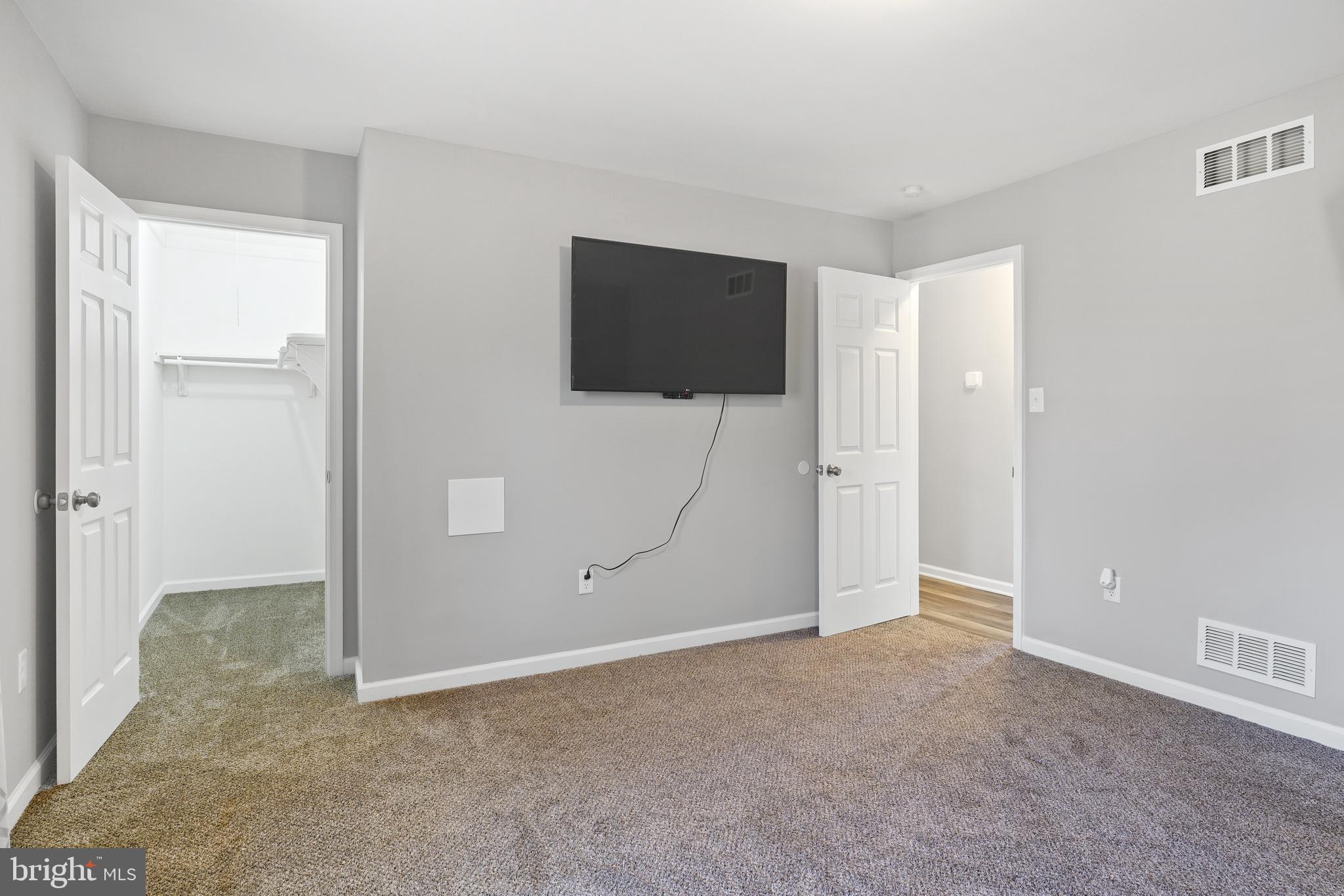 963 Shady Beach Road Elkton, MD 21921 - Photo 13 of 25 Primary bedroom with walk-in closet
