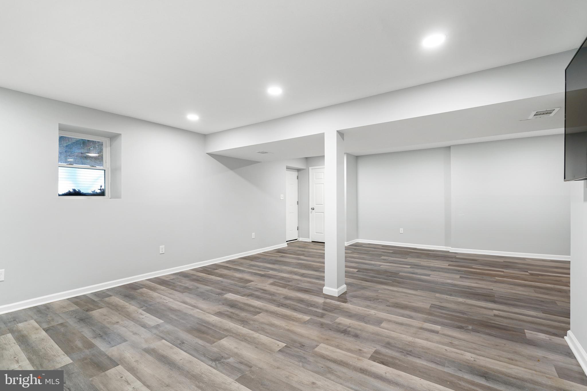 963 Shady Beach Road Elkton, MD 21921 - Photo 20 of 25 Family room with walk-out stairs & egress window