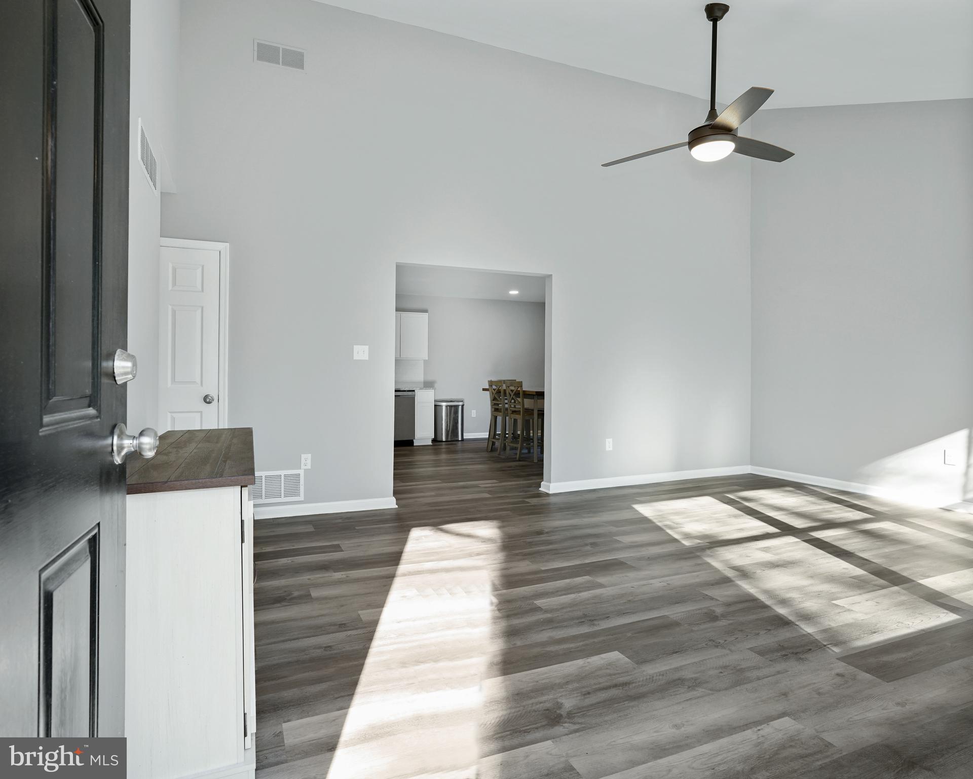 963 Shady Beach Road Elkton, MD 21921 - Photo 6 of 25 Spacious living room with vinyl plank floorring
