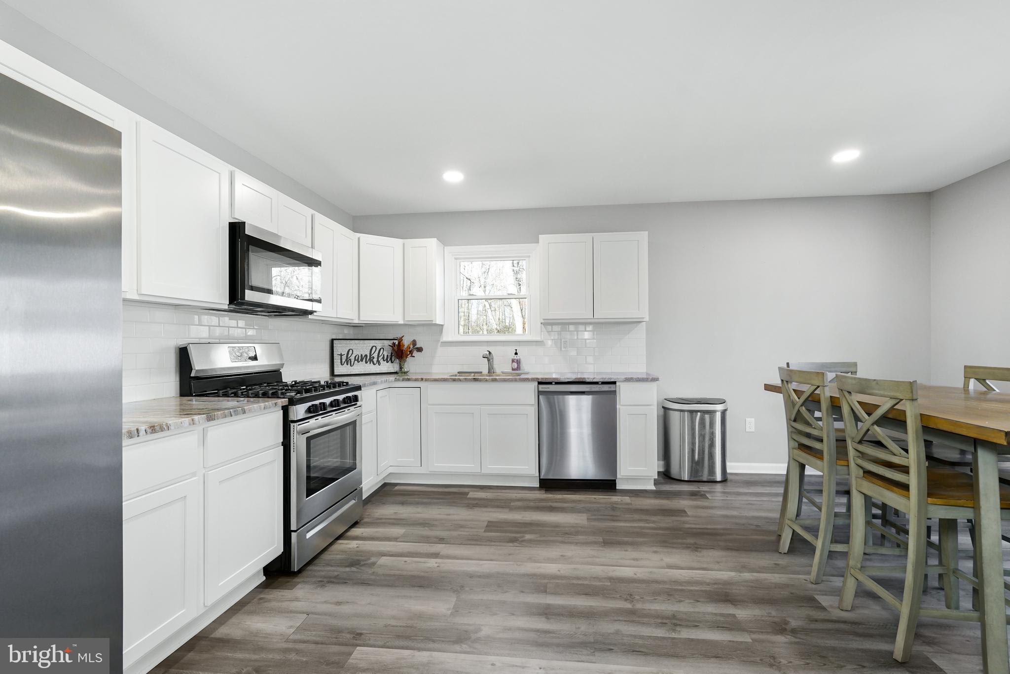 963 Shady Beach Road Elkton, MD 21921 - Photo 10 of 25 Renovated Kitchen with SS appliances
