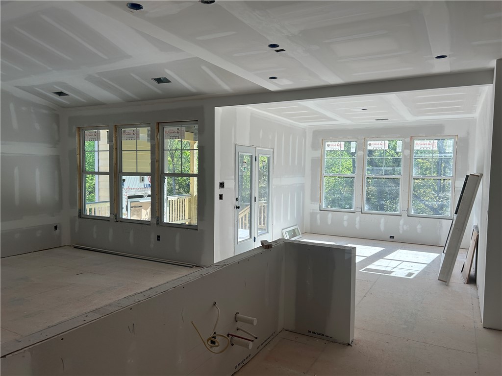 131 Shale Drive Central, SC 29630 - Photo 3 of 9 This bright, unfinished space awaits your personal touch, boasting ample natural light and architectural details.