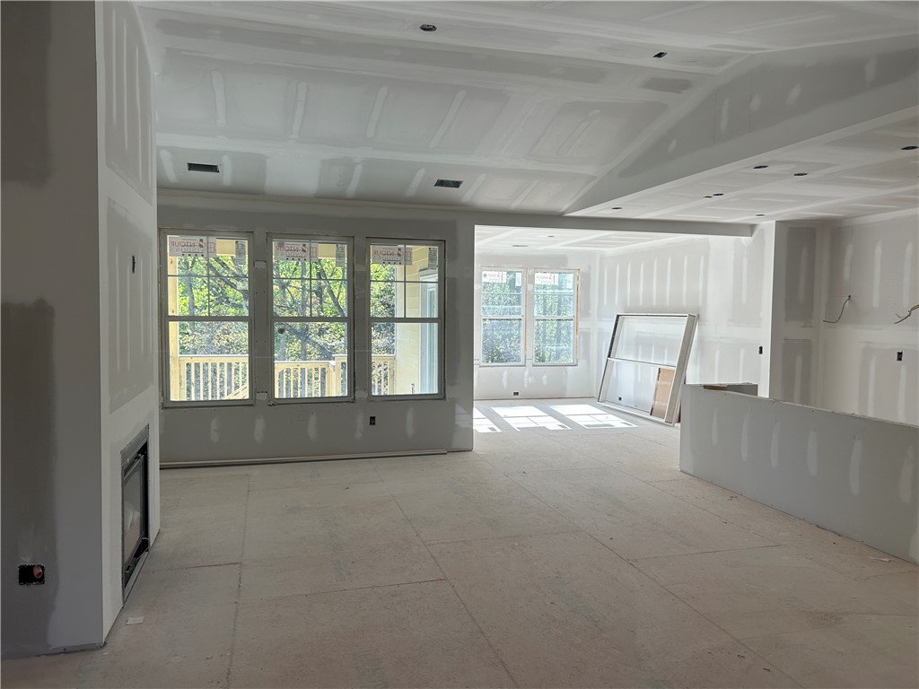 131 Shale Drive Central, SC 29630 - Photo 8 of 9 This bright, open space features large windows and a modern fireplace, awaiting your personal touch.