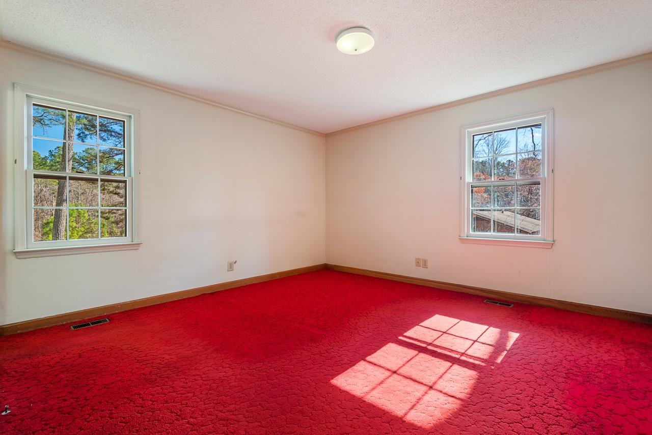 7222 Russell Road Durham, NC 27712 - Photo 11 of 38 a view of empty room with window