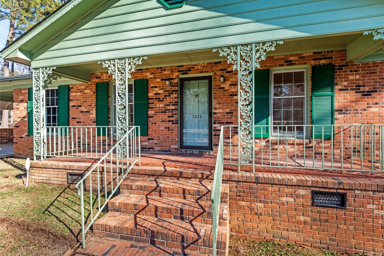 7222 Russell Road Durham, NC 27712 - Photo 2 of 38 an outdoor view of a house with wooden floor