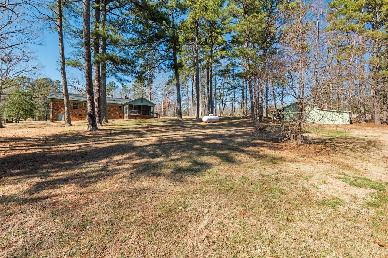 7222 Russell Road Durham, NC 27712 - Photo 27 of 38 a view of a trees in front of a house