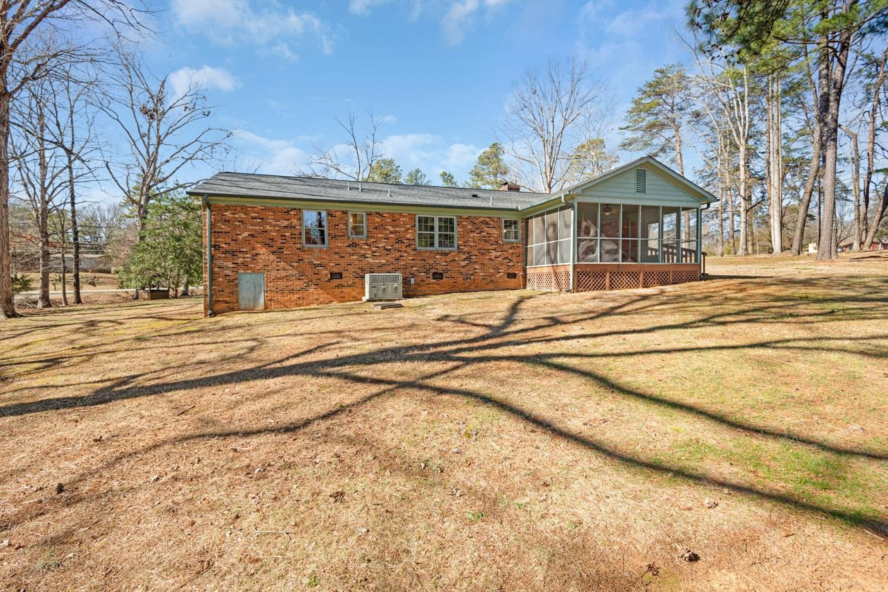 7222 Russell Road Durham, NC 27712 - Photo 34 of 38 a front view of house with yard