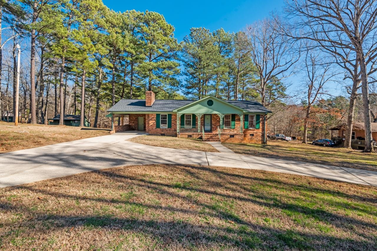 7222 Russell Road Durham, NC 27712 - Photo 38 of 38 a view of a house with a yard