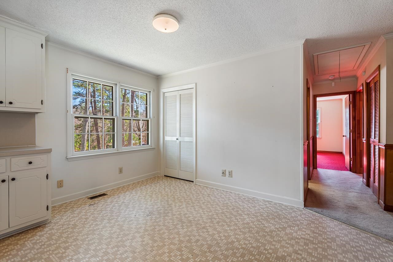 7222 Russell Road Durham, NC 27712 - Photo 9 of 38 an empty room with windows