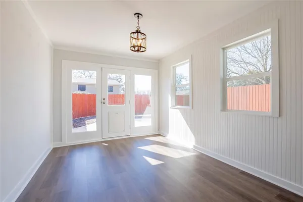a view of entryway with wooden floor