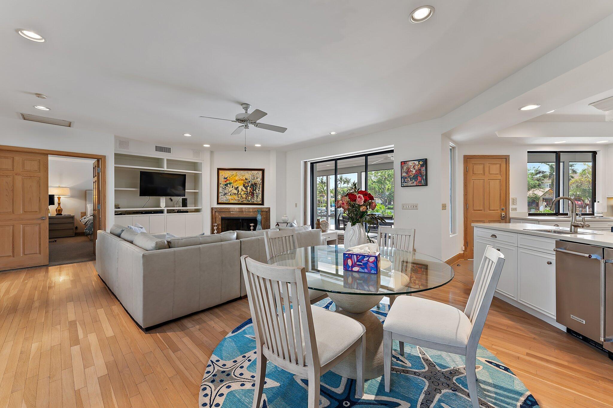 1454 Point Way North Palm Beach, FL 33408 - Photo 16 of 47 a view of a dining room with furniture window and wooden floor