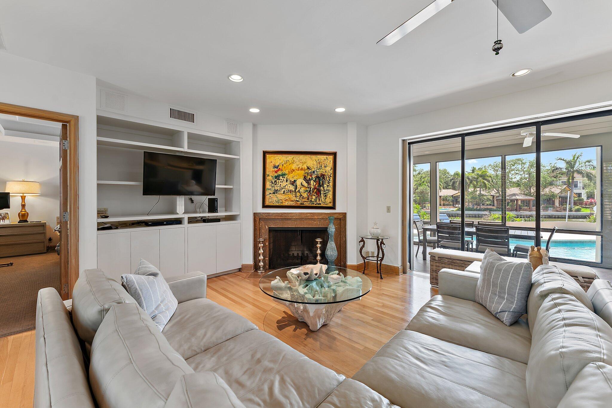 1454 Point Way North Palm Beach, FL 33408 - Photo 17 of 47 a living room with fireplace furniture and a flat screen tv