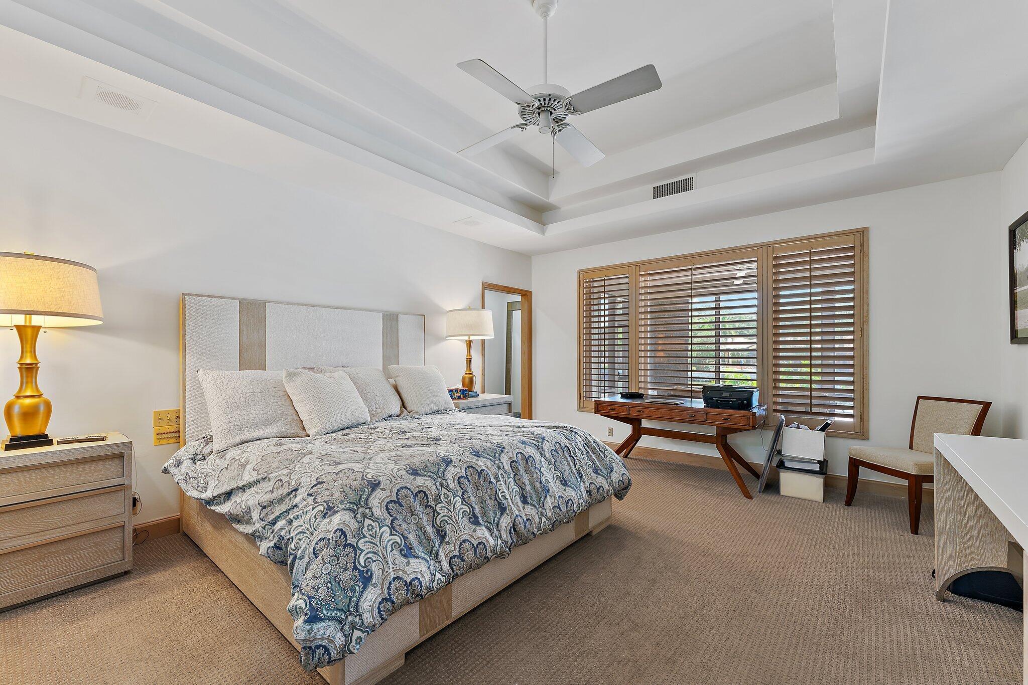 1454 Point Way North Palm Beach, FL 33408 - Photo 19 of 47 a bedroom with a bed a couch and a large window