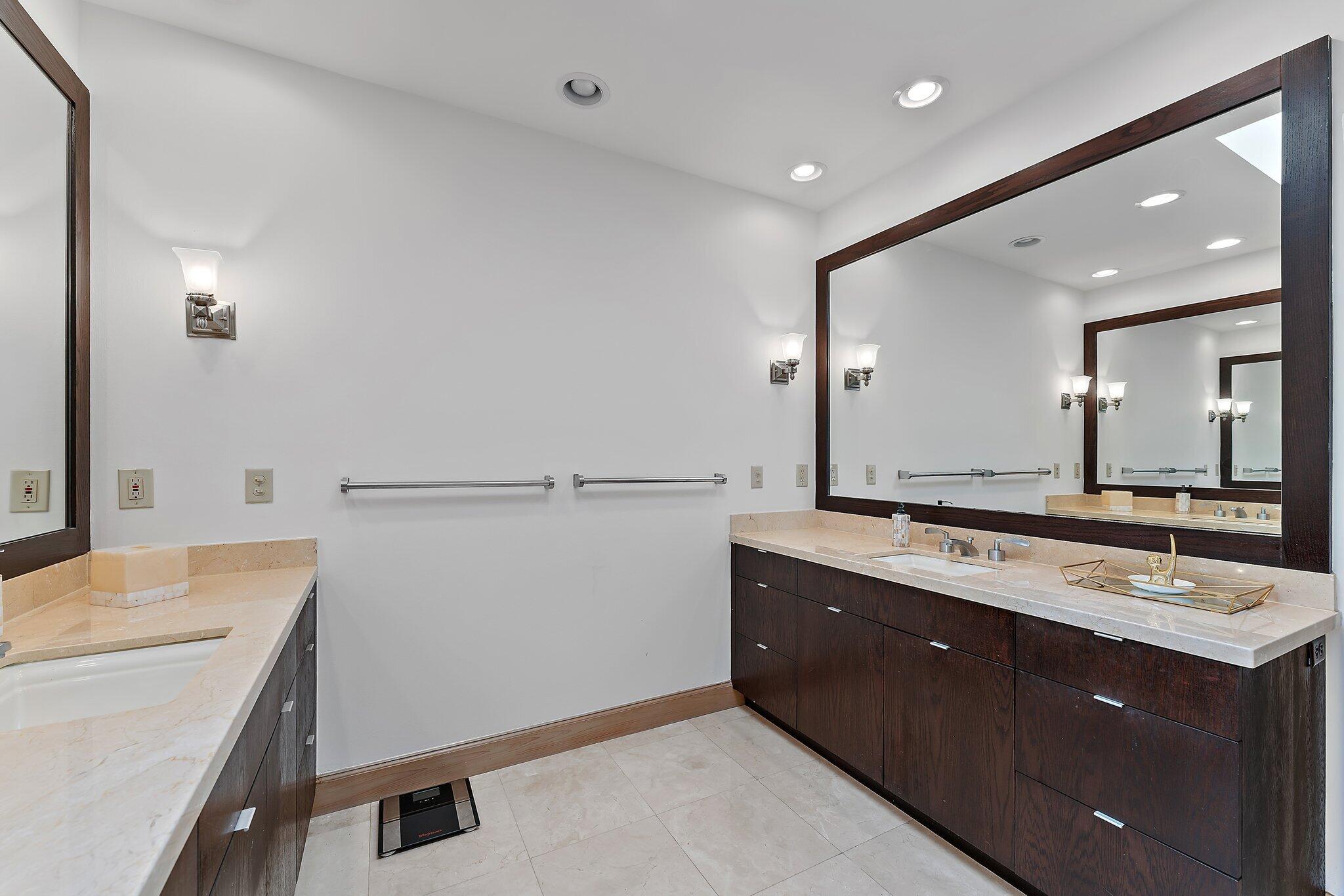 1454 Point Way North Palm Beach, FL 33408 - Photo 22 of 47 a bathroom with a sink and a mirror