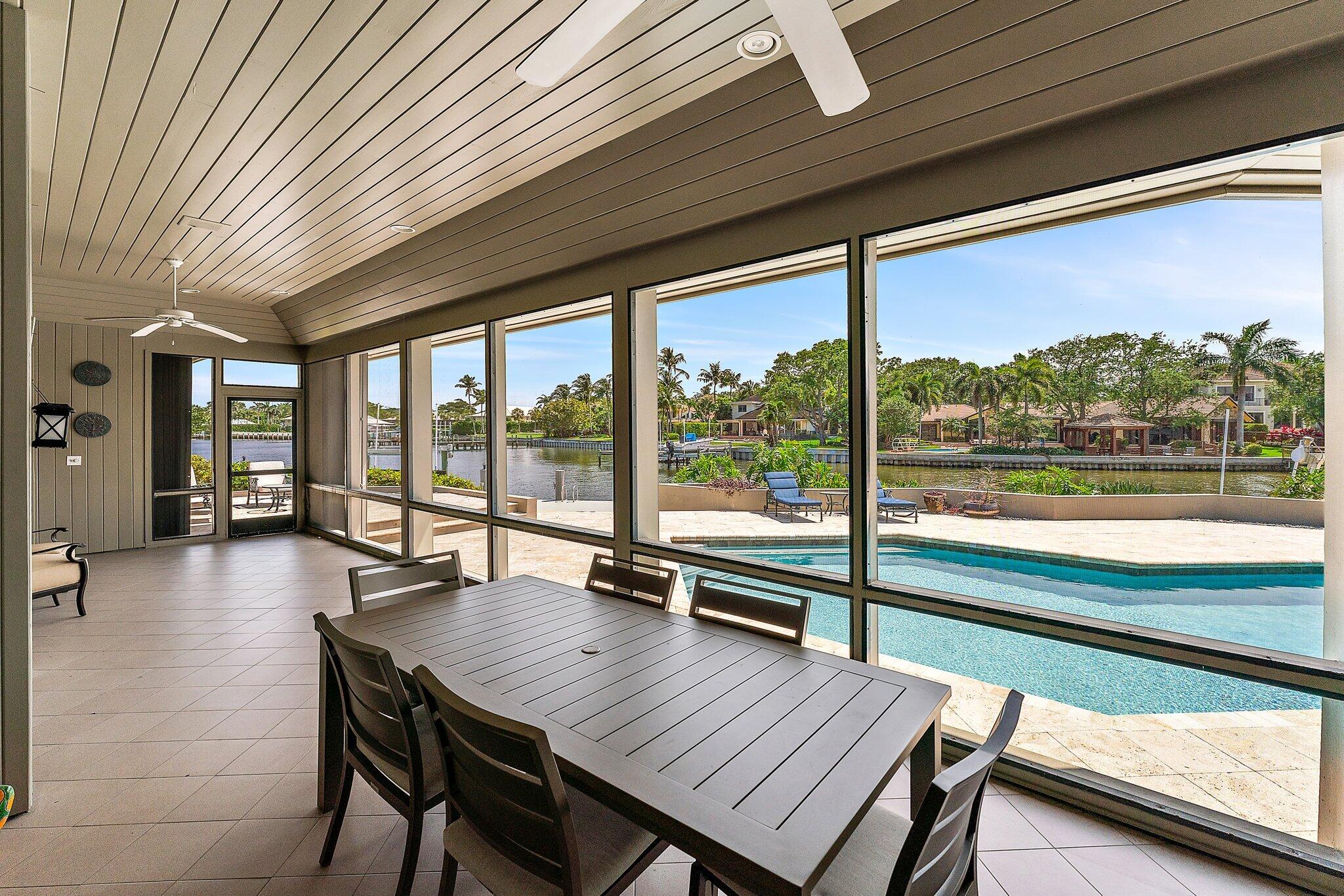 1454 Point Way North Palm Beach, FL 33408 - Photo 34 of 47 a view of a patio with a table chairs and a table