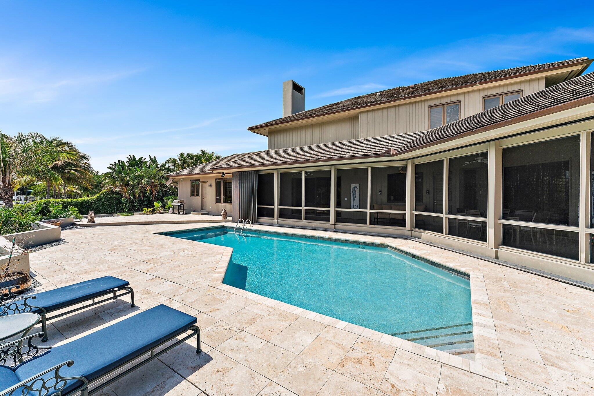 1454 Point Way North Palm Beach, FL 33408 - Photo 41 of 47 a view of a house with a swimming pool